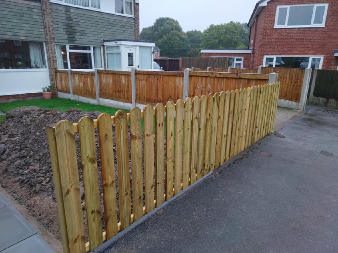 New timber picket fencing and panel fencing at a front garden